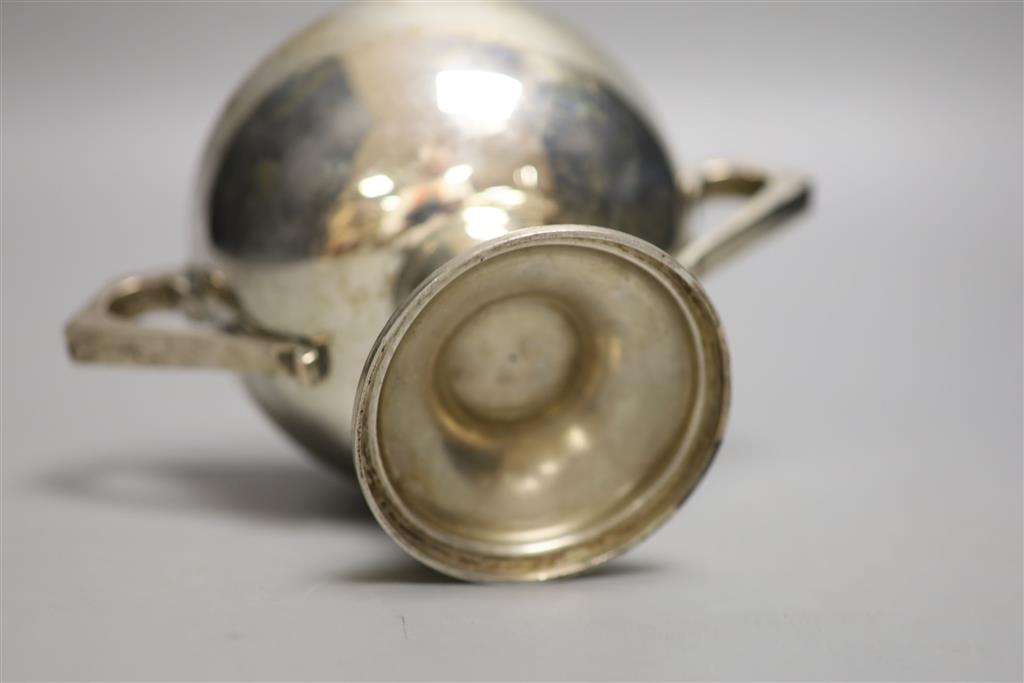 An Anglo-Indian silver two-handled pedestal rose bowl, marked C & K (Cooke & Kelvey), snake and SIL, height 10cm, 12.18oz